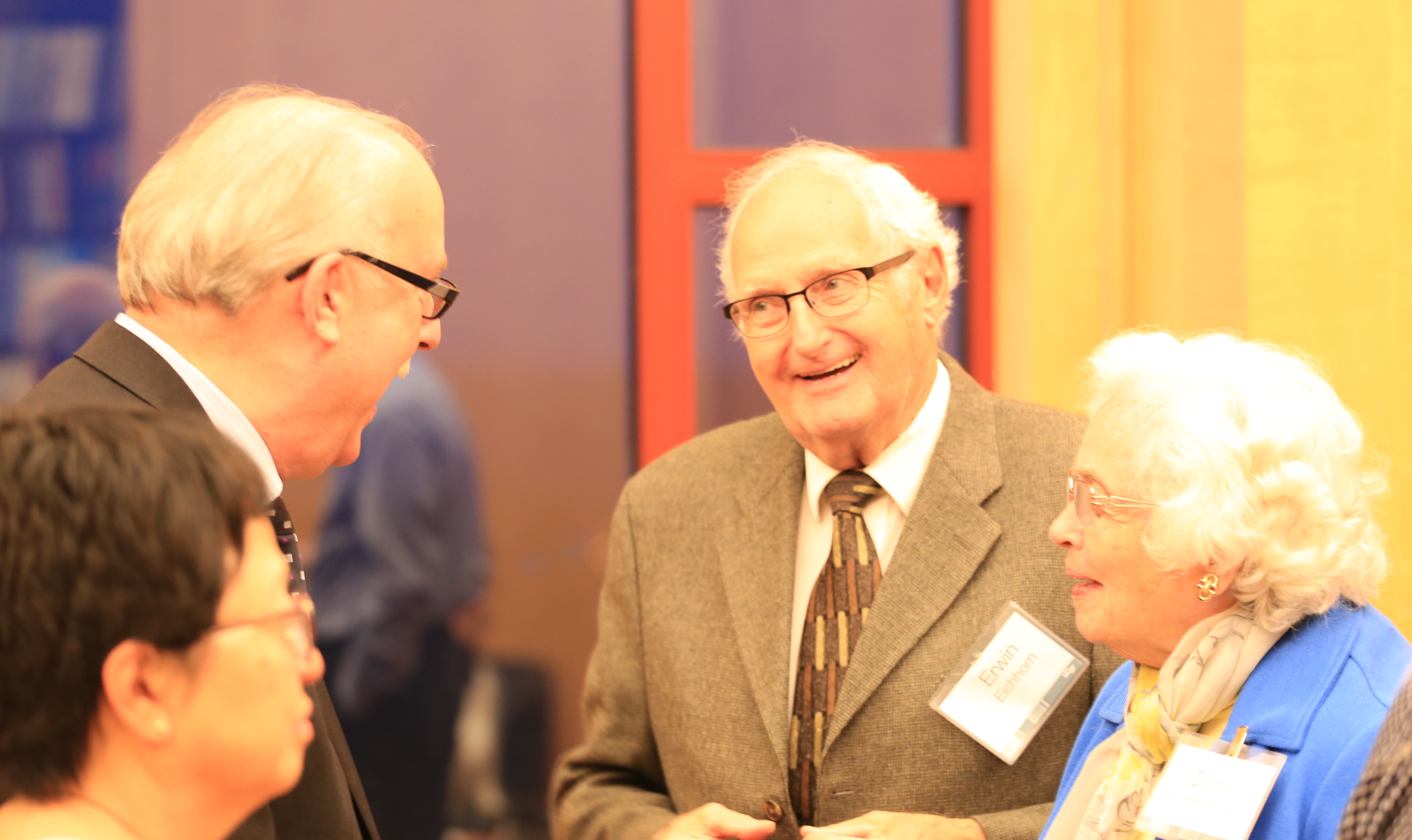 Dean David Vlahov shares a moment with donors Erwin A. and Donis B. Eicchorn ‘64