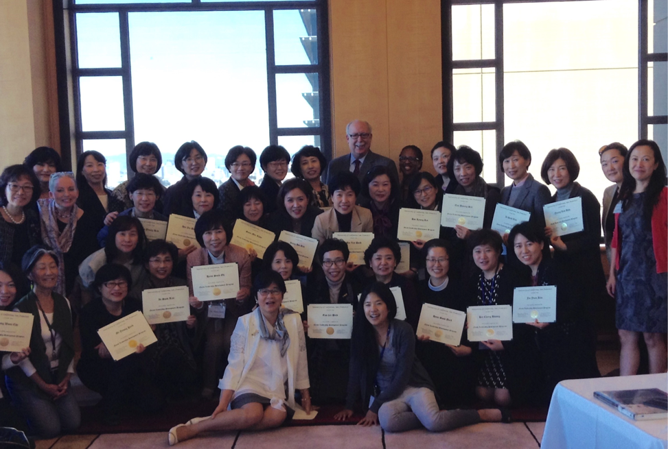 Participants in the Leadership Conference for the Korean Hospital Nurses Association pose with their certificates of completion in the UCSF Kalmanovitz Library Lange Reading Room.