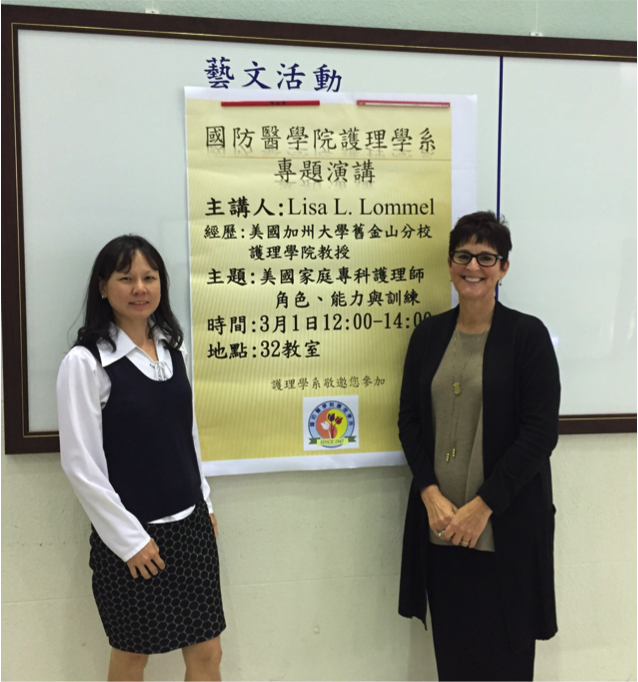 Dr. Chen and Lisa Lommel, RN, PhD(c), FNP, MPH, stand in front of poster in Taipei.