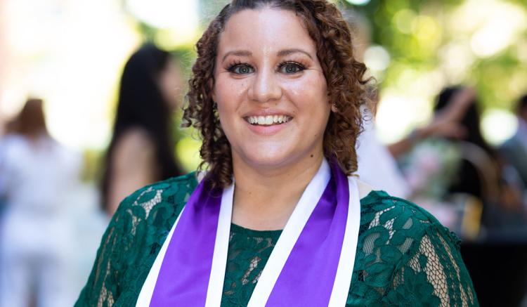 Student Crystal Garcia celebrates at the Pinning Ceremony.