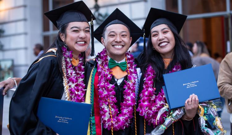 Members of the Class of 2023 gather at Herbst Theatre for Commencement.