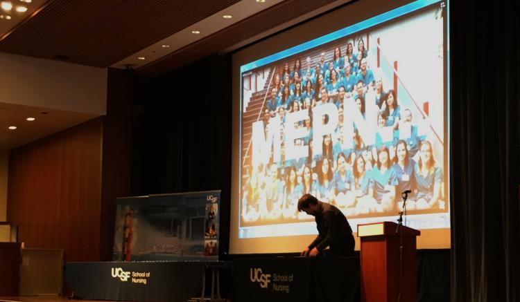 Student Affairs Officer Steven Johnson ensures the ceremony’s final details.