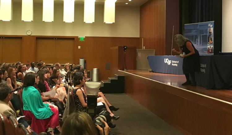 Clinical Professor Pam Bellefeuille rouses her students’ with enthusiastic well wishes for their continued success!