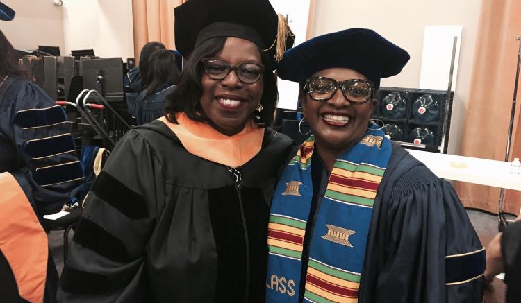 Keynote speaker and distinguished guest Sheila Antrum with doctoral graduate Linda Gregory.