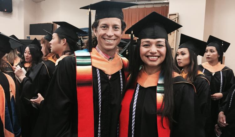 Voces Latinas graduates pose as they await the start of commencement.