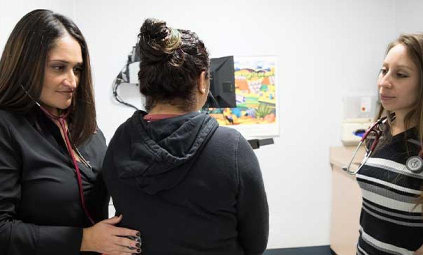 Through the School of Nursing's Rural Health concentration, Assistant Professor Elizabeth Castillo (left) is helping students learn about the barriers rural communities face and how to address them. (Photo credit: Elisabeth Fall) 