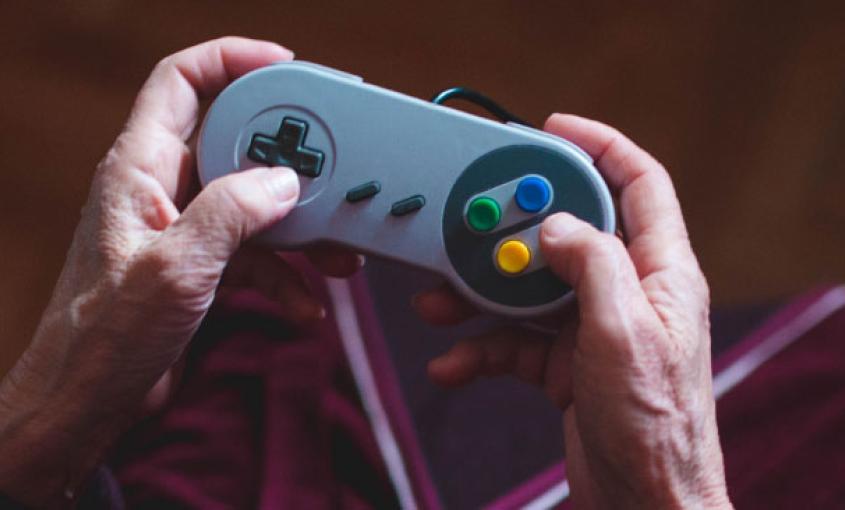  Hands on a video game controller
