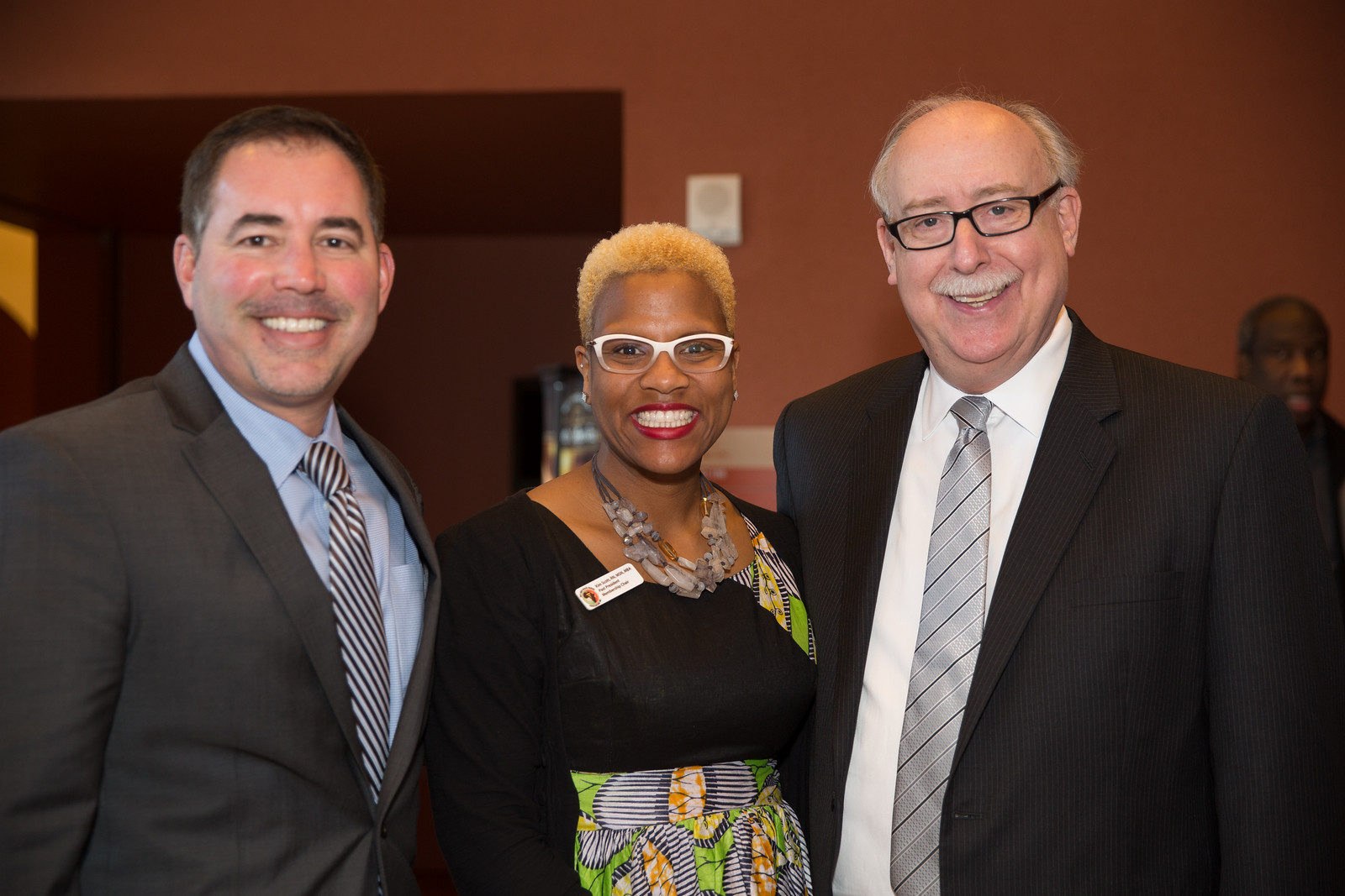 Director of Recruitment and Outreach Sergio Saenz, BABNA President Kim Scott, and Dean David Vlahov pose at the Multicultural Nursing Mixer in the UCSF Mission Bay Pub. Photo credit: Elisabeth Fall.