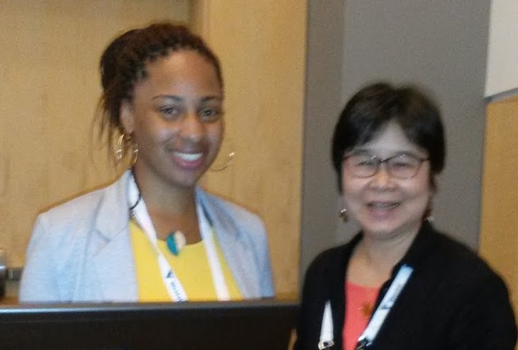 Brianna Singleton and Oi Saeng Hong pose for a photograph at the conference