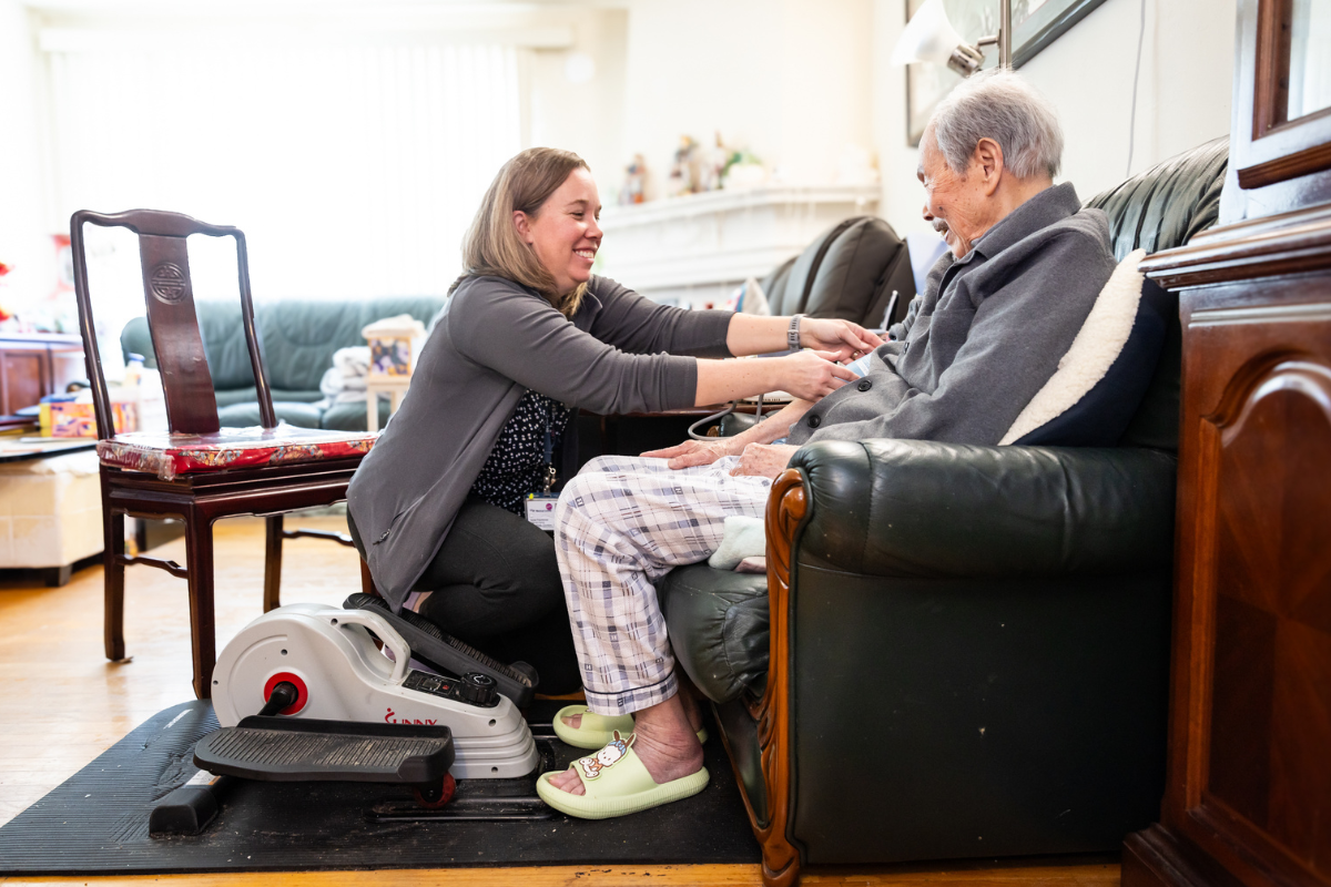 Nurse practitioner Courtney Gordon provides care to a patient in their home.