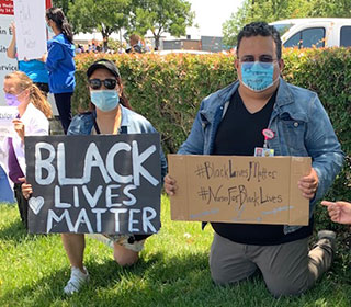 Adrian Espinosa attends a Black Lives Matter rally.