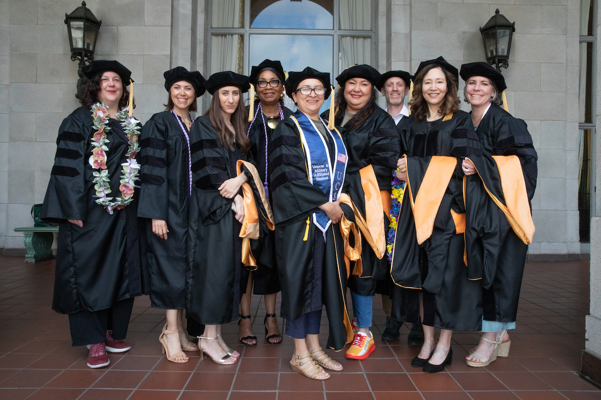 Nine students from the DNP class of 2023 at commencement