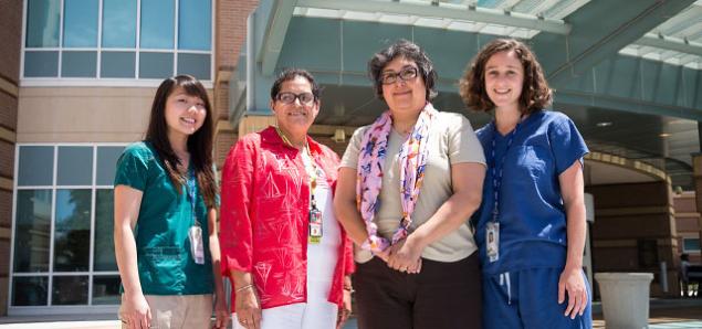 At the VA Palo Alto Health Care System, from left: Julie Tea, MEPN student; Gloria Martinez, associate director for Patient Care and Nursing Services; Denise Renfro; and Sophia Nogue, MEPN student (photo by Elisabeth Fall)