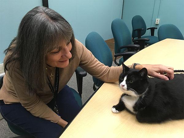 Michele Keating with Duke the therapy cat