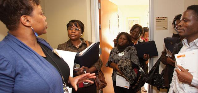 Nurse practitioner Esker-D Ligon (far left) leads a tour of Glide Health Services for Malawi fellows Angela Chimwaza, Maria Chikalipo, Alice Bvumbwe and Spy Munthali (photo by Elisabeth Fall).