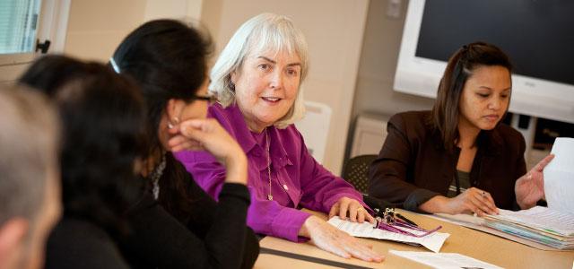 Anne Hughes with the palliative care and hospice team at San Francisco’s Laguna Honda Hospital and Rehabilitation Center (photo by Elisabeth Fall)