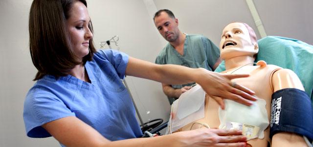 Nursing doctoral student Rich Fidler observes an internal medicine resident practicing in the San Francisco VA Medical Center's Simulation Center (photos by Elisabeth Fall).