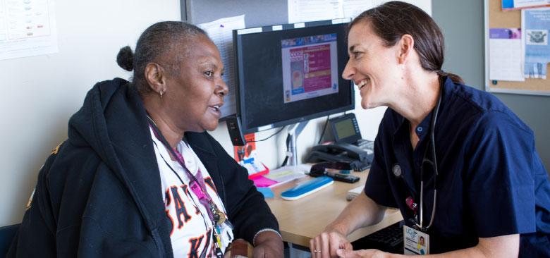 Nurse practitioner Janeen Rojas with a patient (photos by Elisabeth Fall)