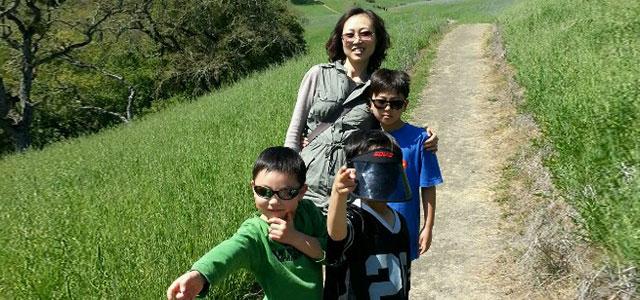 JiWon Choi walking with her children