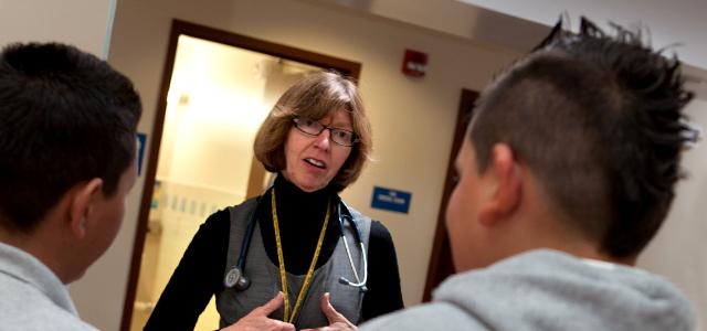 Karen Duderstadt, PhD, RN, FAAN, with students at James Madison Middle School (photo by Elisabeth Fall)