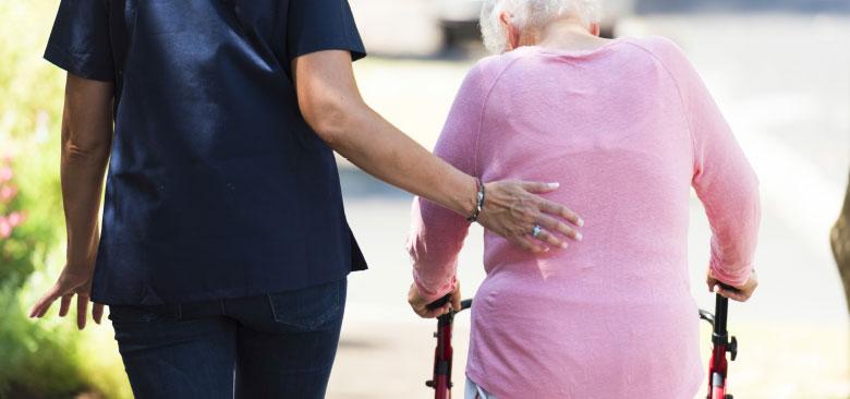 Nurse walks with patient 