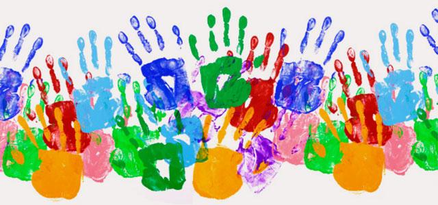 Picture of overlapping handprints made in colorful paint. 