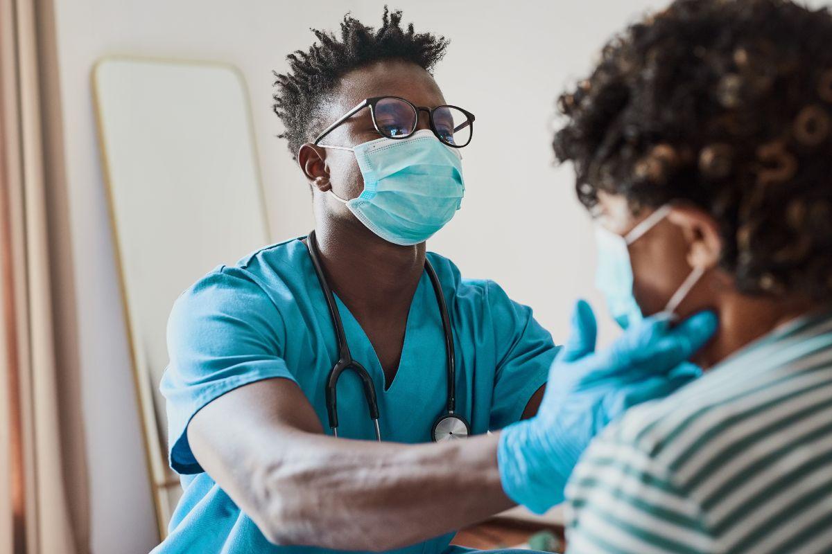 Health care provider examining a patient