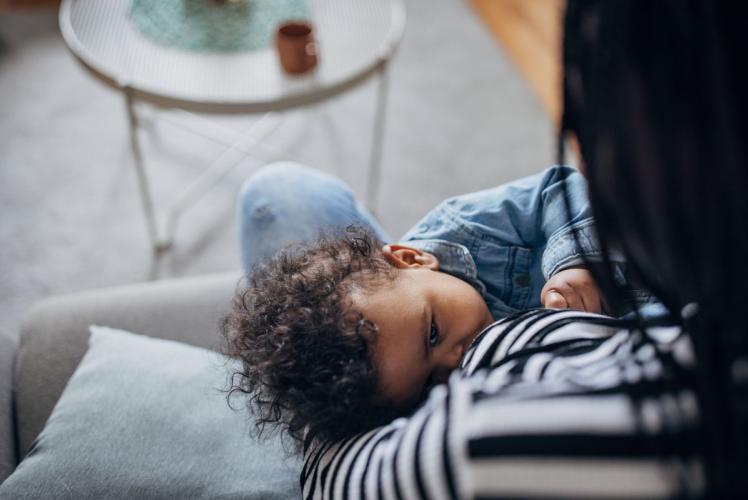 Person breastfeeding an infant