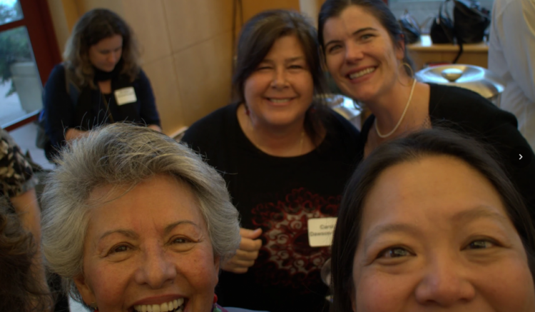 Group of faculty are all smiles at the end of the award ceremony