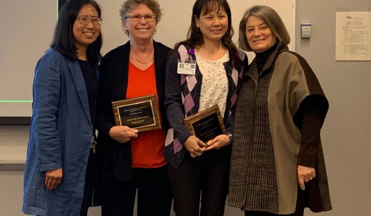 Annette Carley and Jyu-Lin Chen received the award for Excellence in Educational and Curricular Innovation. They are pictured with Dean Catherine L. Gilliss, left, and Soo-Jeong Lee, chair of the Faculty Council.