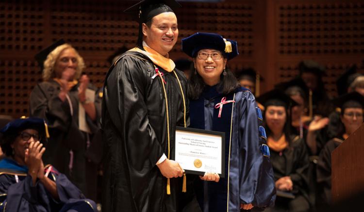 Francisco Alvarez received the Outstanding MS Student Award, presented by faculty member Soo-Jeong Lee.