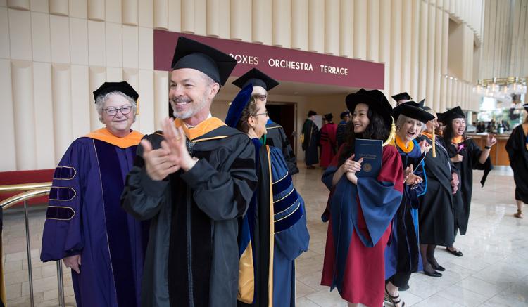 School of Nursing faculty celebrate commencement.