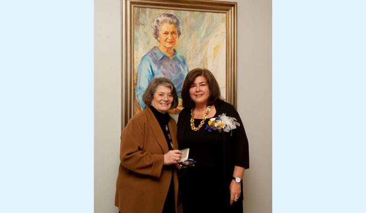 Dean Catherine Gilliss congratulates Carol Dawson-Rose as the 40th Helen Nahm Research Lecture Award recipient. Dean Catherine Gilliss congratulates Carol Dawson-Rose as the 40th Helen Nahm Research Lecture Award recipient.