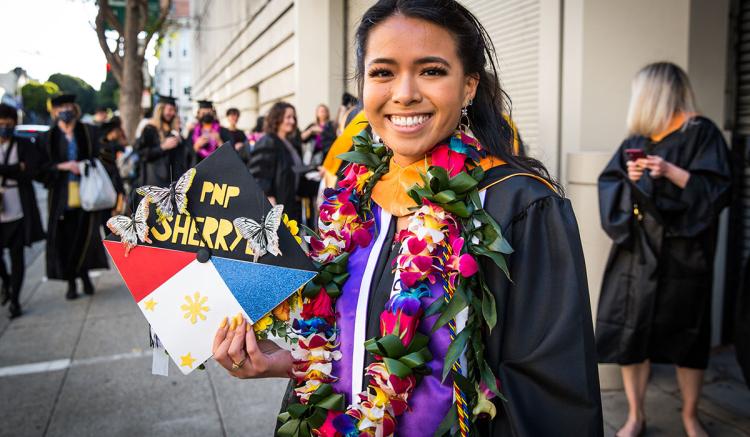 Sherryl-Anne Cafino Perez celebrates earning her degree at Commencement.