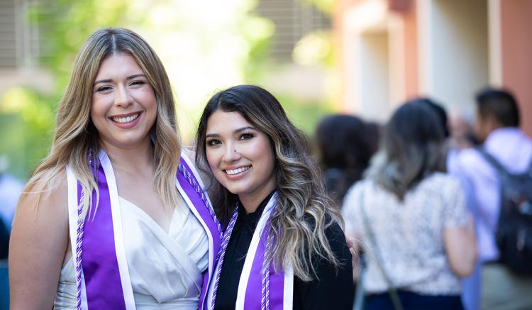 MEPN students Iliana Rodriguez and Kristal Medina celebrate at the Pinning Ceremony on June 11, 2022.