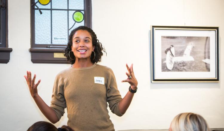 Student DIVA representative Amber Bell shares with the group during the evening’s program.