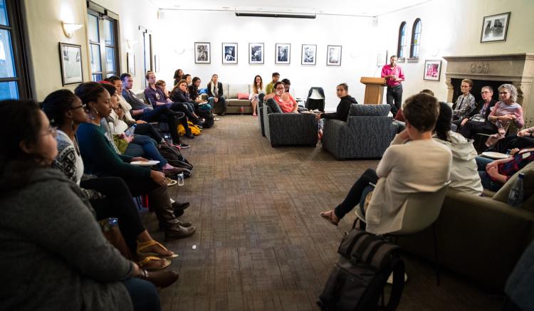 Professor Howard Pinderhughes leads the group in shared conversation during the DIVA Welcome Reception.