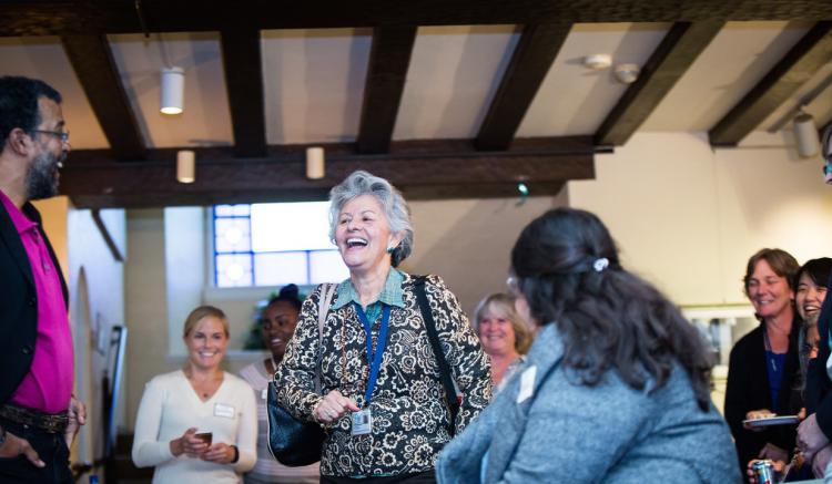 Clinical Professor Pilar Bernal De Pheils shares with the group at the DIVA Welcome Back Reception.