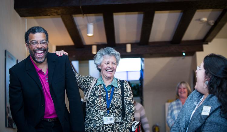 Clinical Professor Pilar Bernal De Pheils shares a moment with Professor Howard Pinderhughes and the group at the DIVA Welcome B