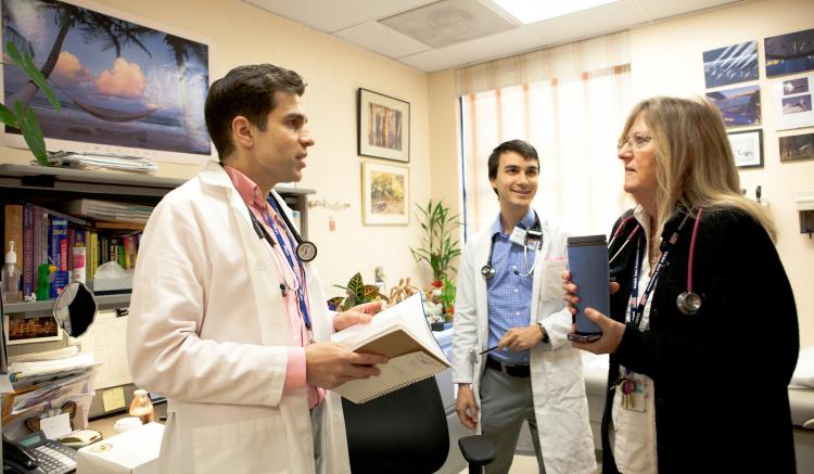 Nurse practitioner Jonathan Van Nuys, medical resident Michael Wongchaowart, and faculty member Susan Janson