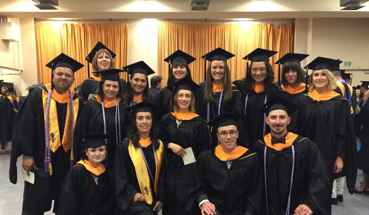 Psych Master’s students pose for a group shot before the ceremony.