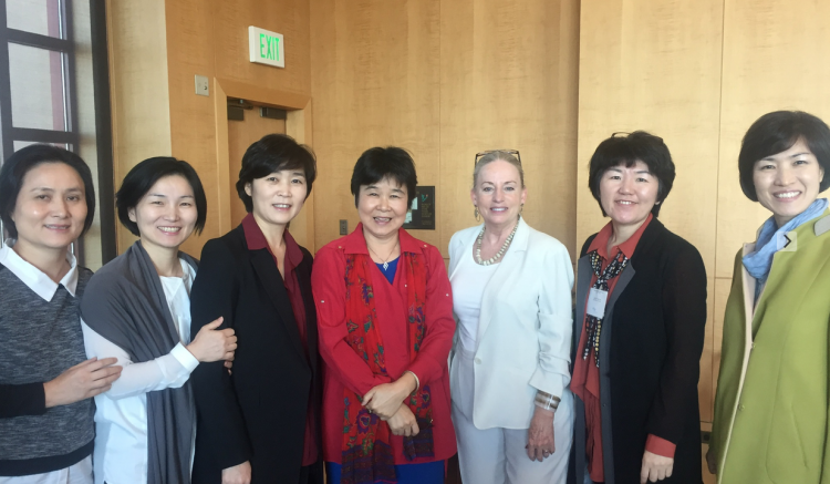 Group poses with UCSF co-hosts Hong and Fleming (center).