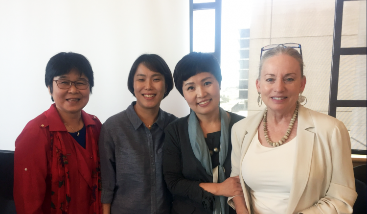 Professors Hong and Fleming pose with KHNA leaders.