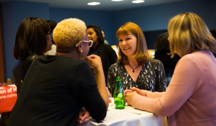 UCSF School of Nursing Professor Joanne Spetz with Multicultural Nursing Mixer participant. Photo credit: Elisabeth Fall.