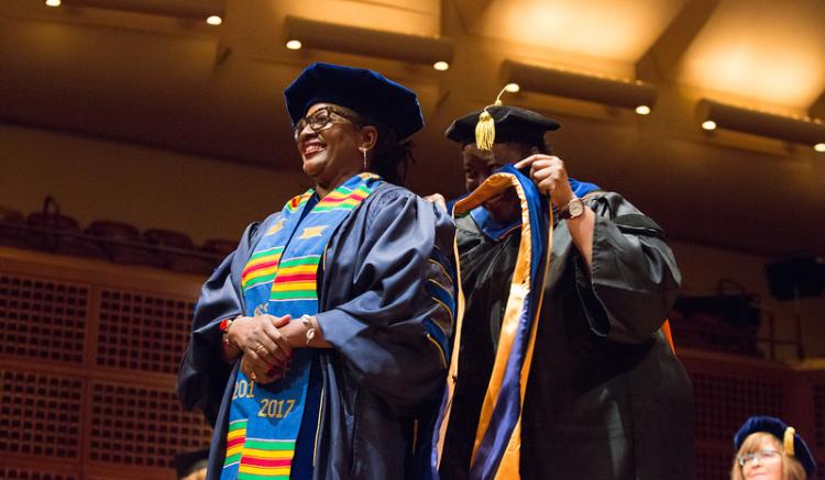 student receives degree