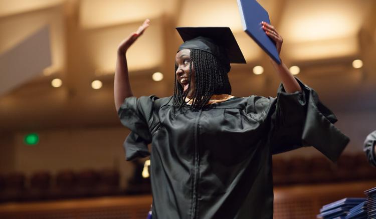 graduate celebrates