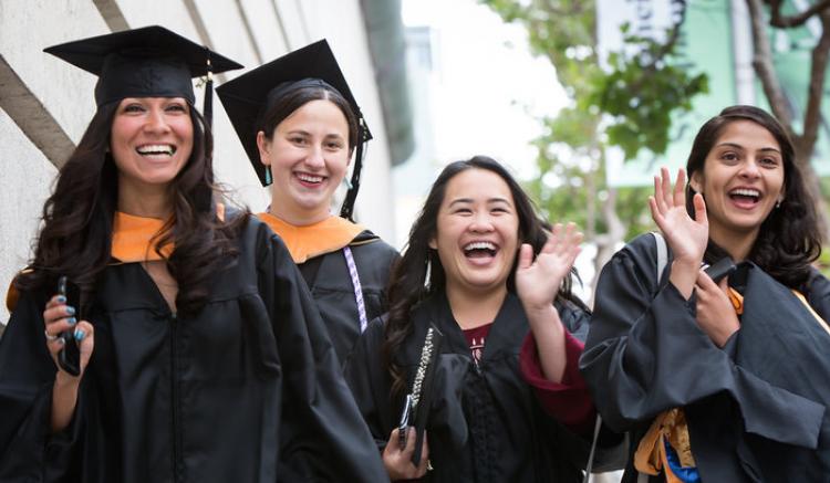 group walks to commencement