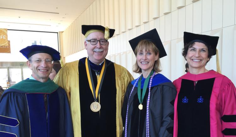 EVCP Lowenstein, Dean Vlahov, CEO Trautman, and Vice Chancellor & Dean Watkins pose for a photo following commencement.