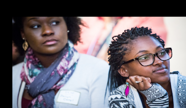 Students listen at the DIVA Welcome Reception.