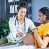 Nurse provides care to patient in their home